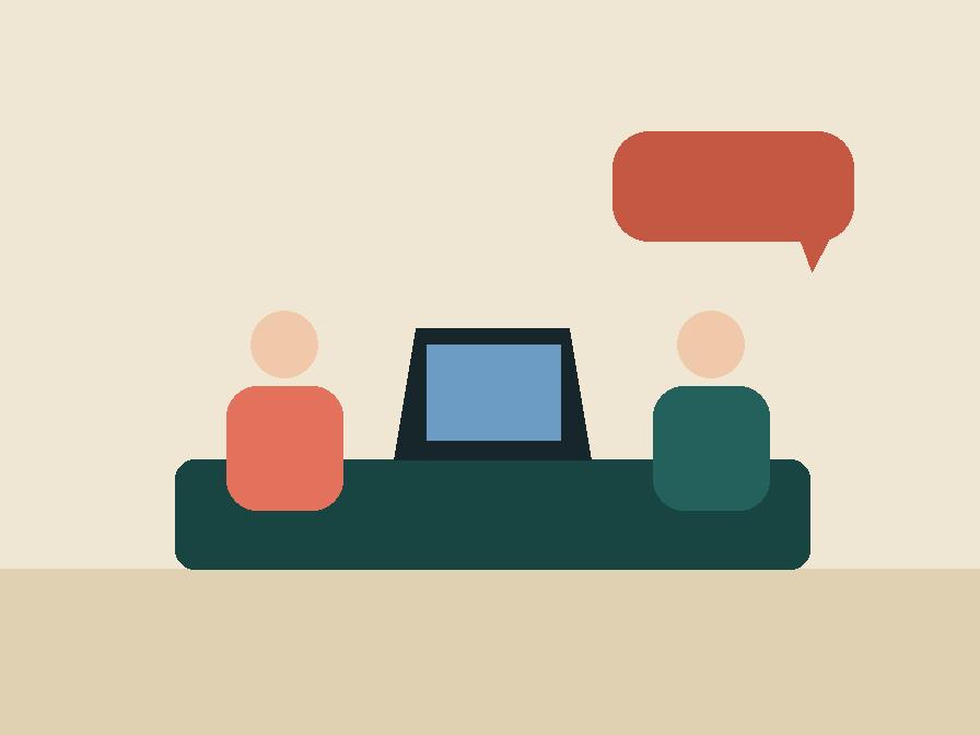 One-to-one coaching session at the tutor's desk